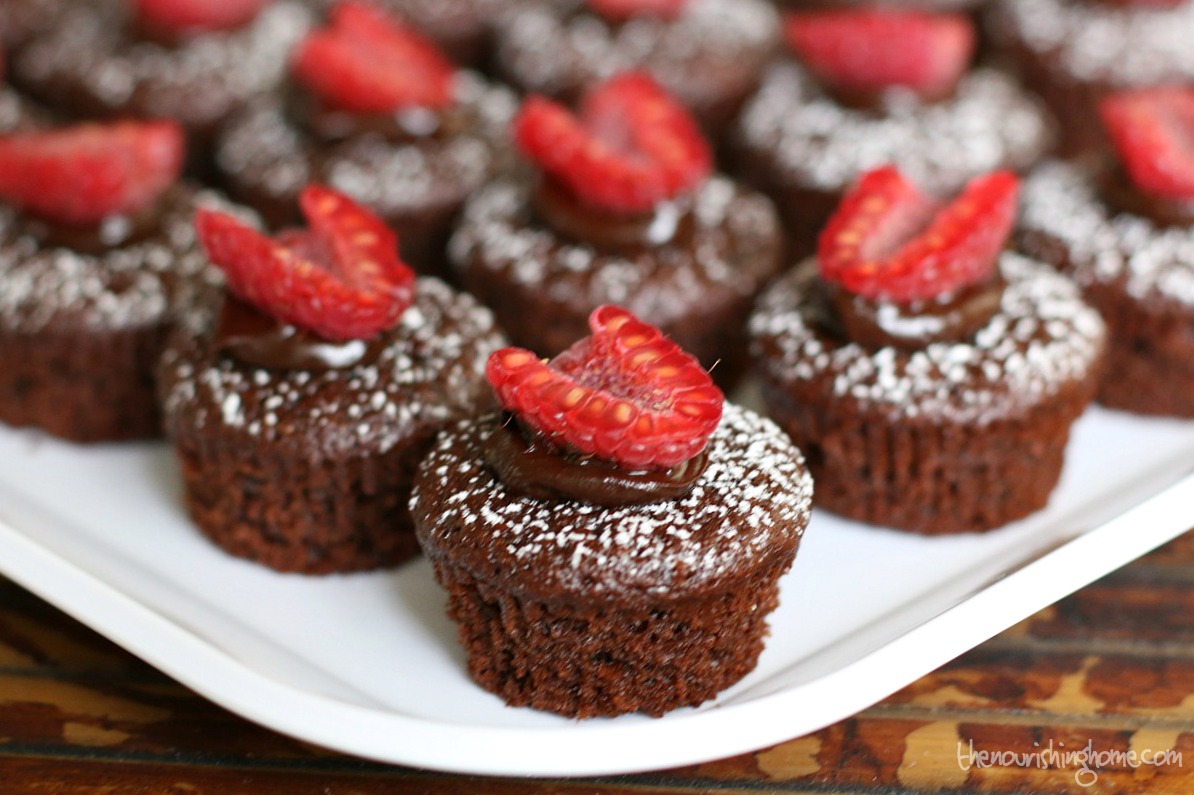 These grain-free Chocolate Dipped Raspberry Brownie Bites are incredibly easy to make and are far healthier than you might think!