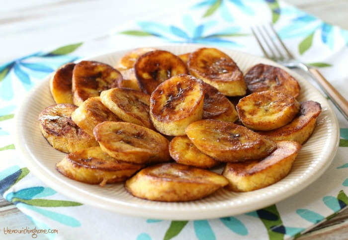 These scrumptious cinnamon dusted fried plantains are a staple around here. They're rich in nutrients and flavor making any meal a sweet and savory delight!