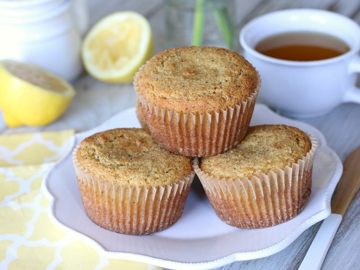 Flecked with crunchy poppy seeds and bursting with sweet lemony goodness, these grain free and dairy free lemon poppy seed muffins are lemon-poppy perfection!